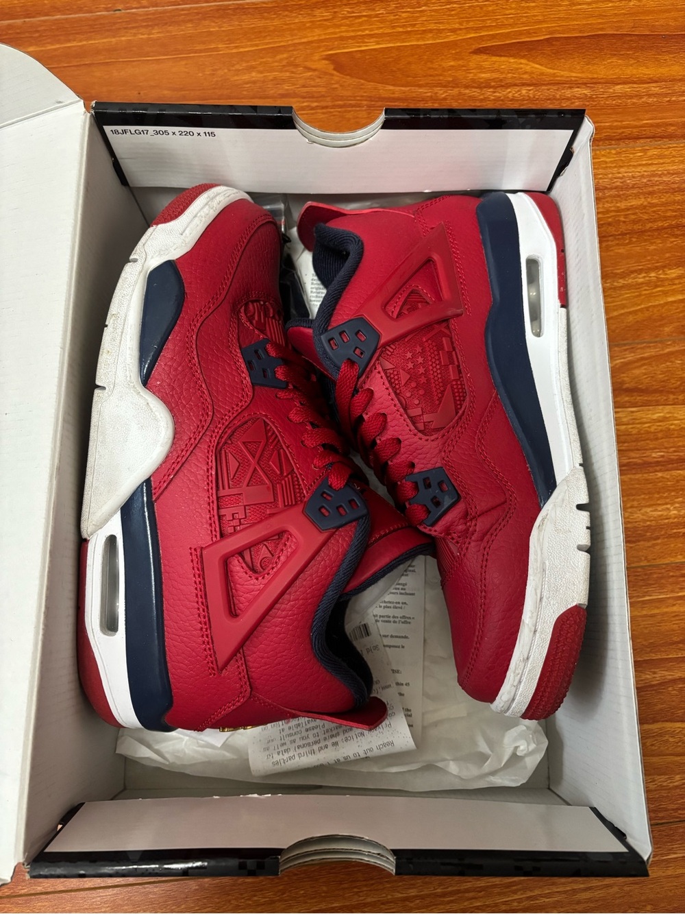 Air Jordan Retro 4 Grade School 
Gym Red/Obsidian-White